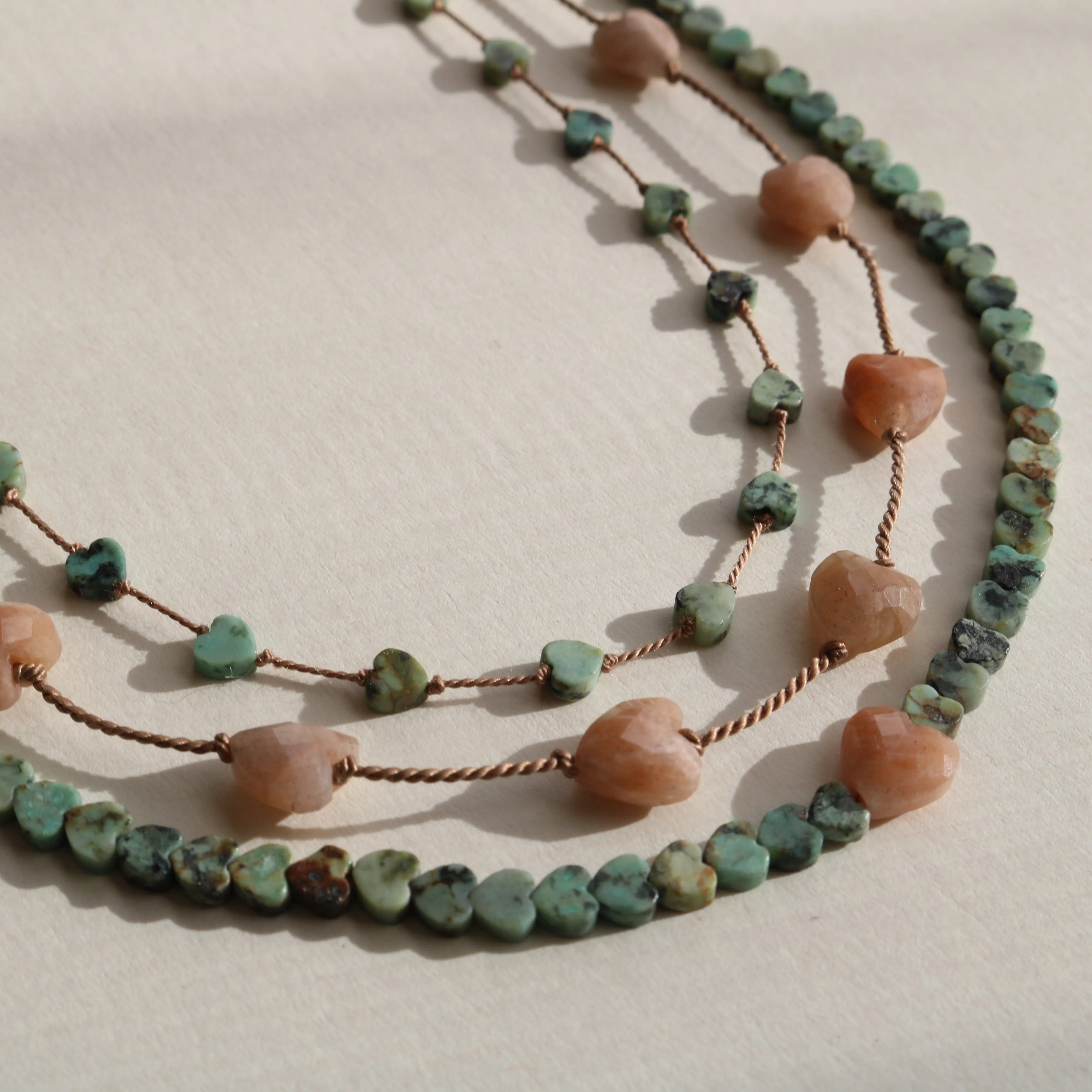 AFRICAN TURQUOISE JASPER & SUNSTONE HEART OM NECKLACE