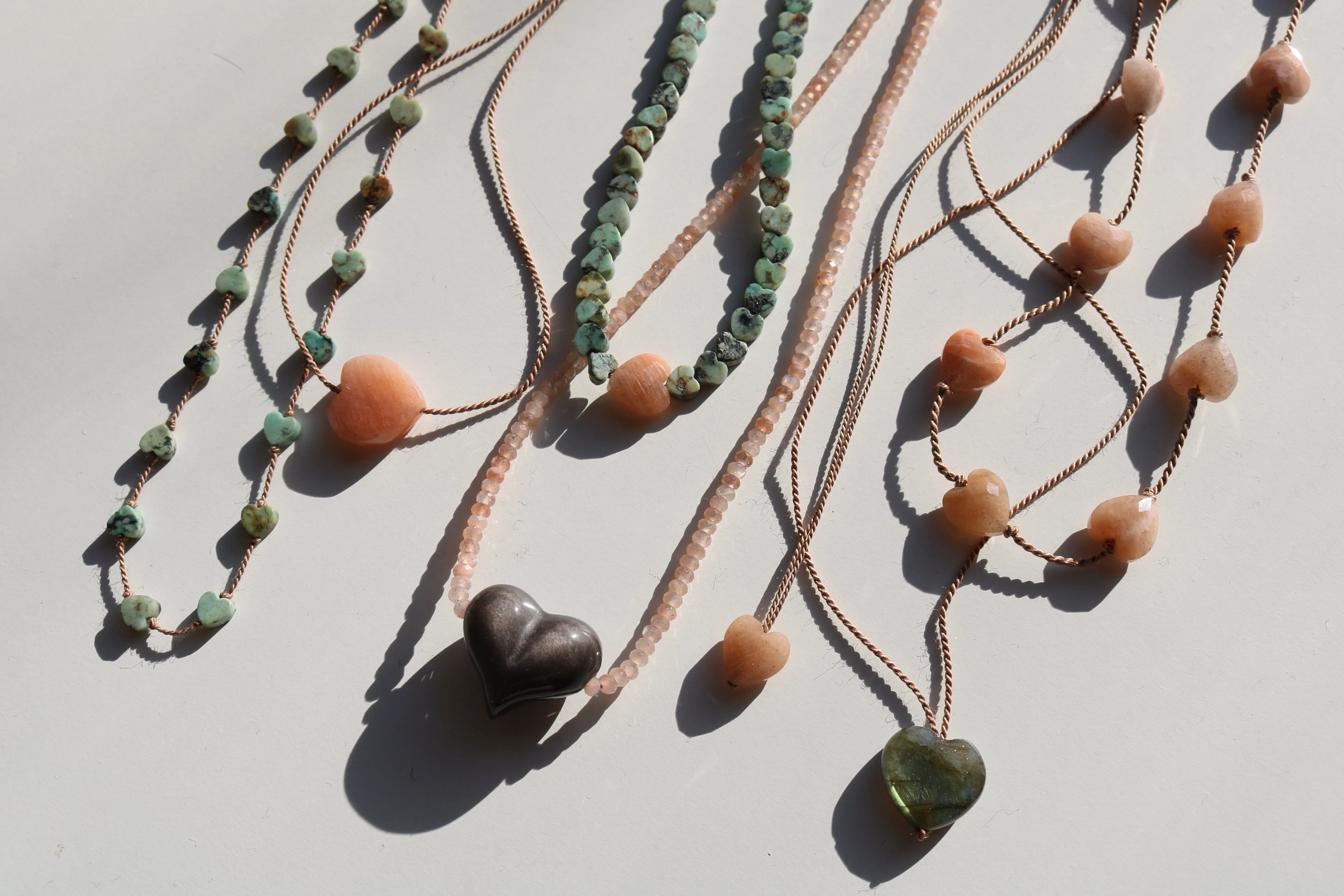 AFRICAN TURQUOISE JASPER & SUNSTONE HEART OM NECKLACE