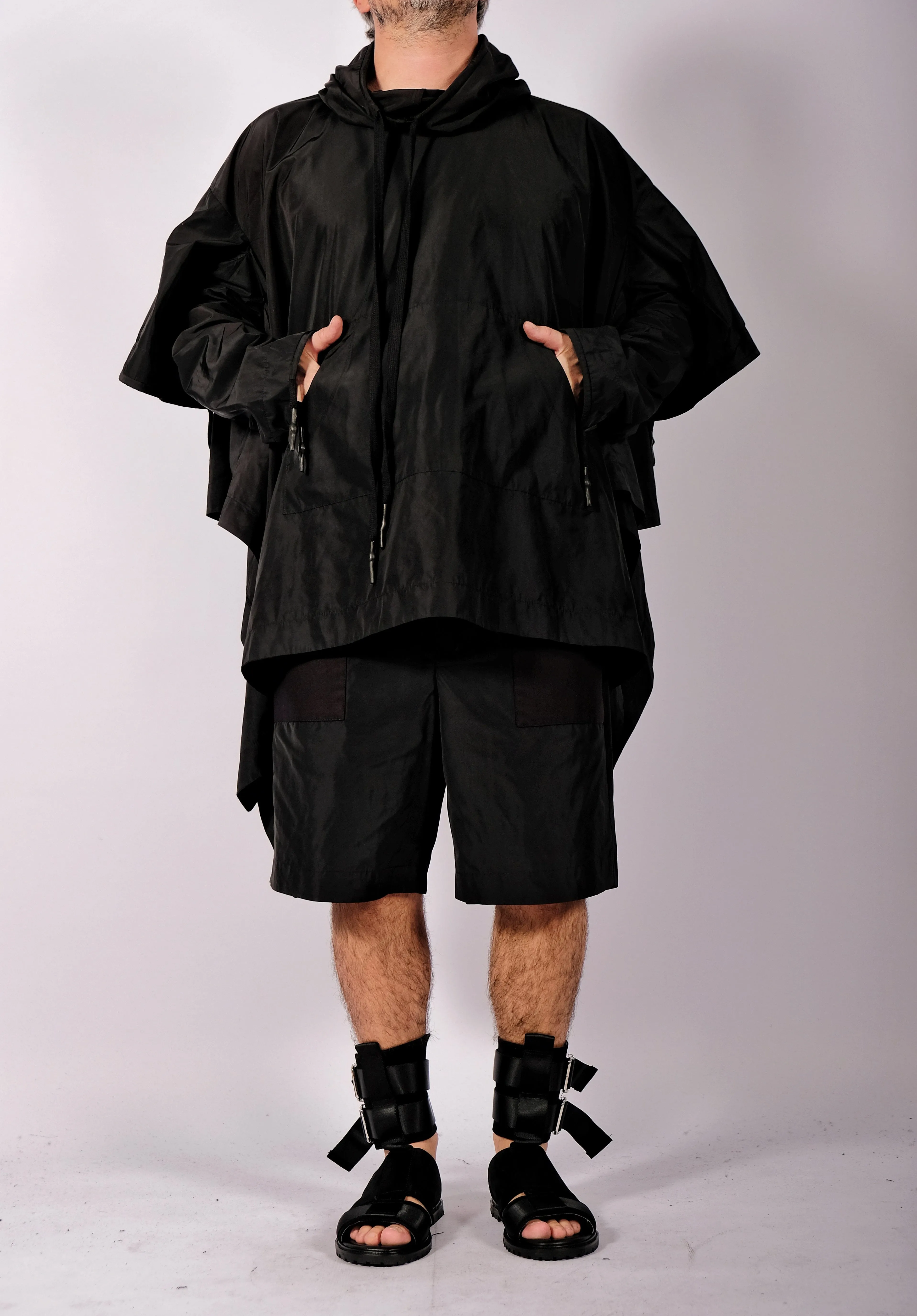 Raincoat Cape with Four Sleeves