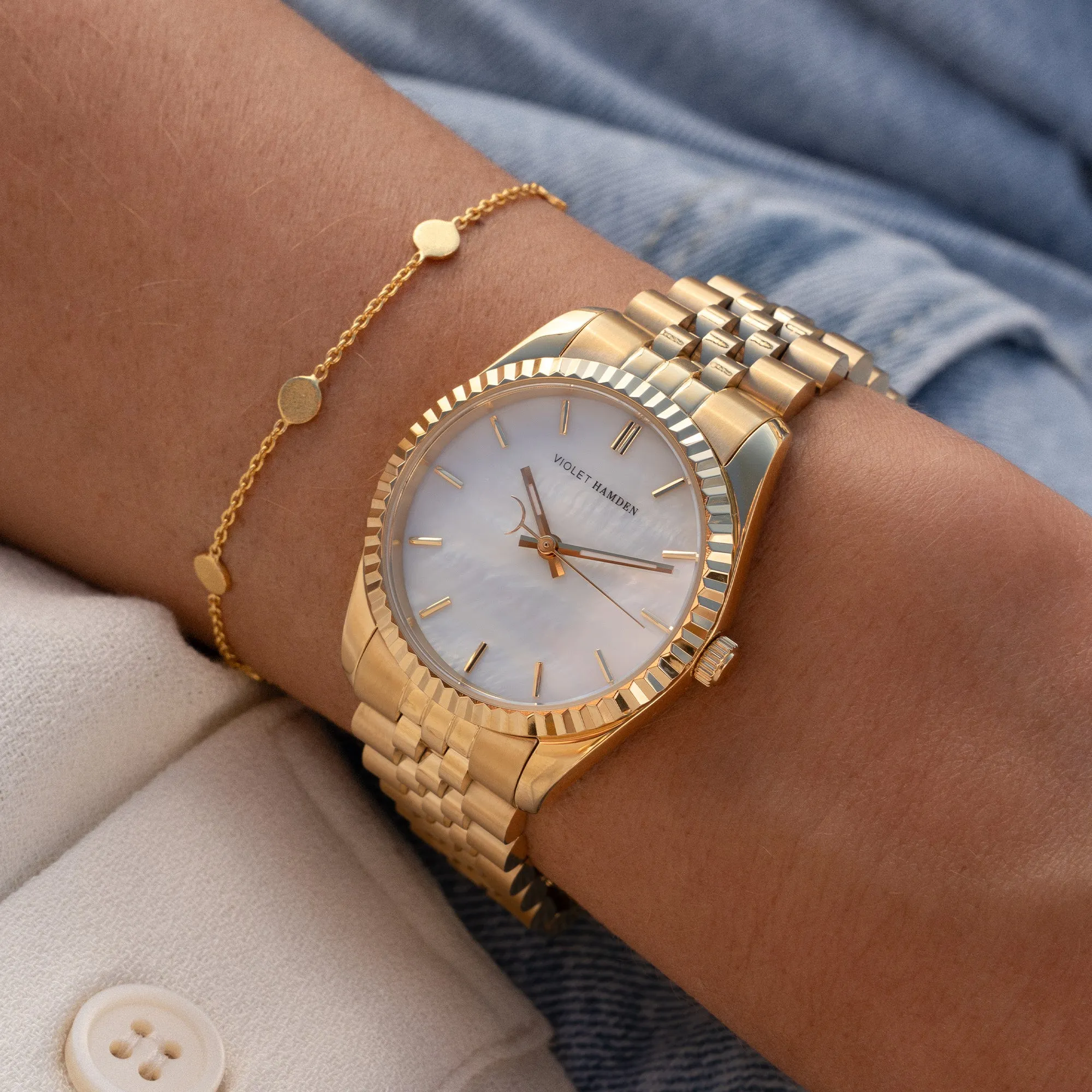 Sunrise round ladies watch gold coloured and mother of pearl