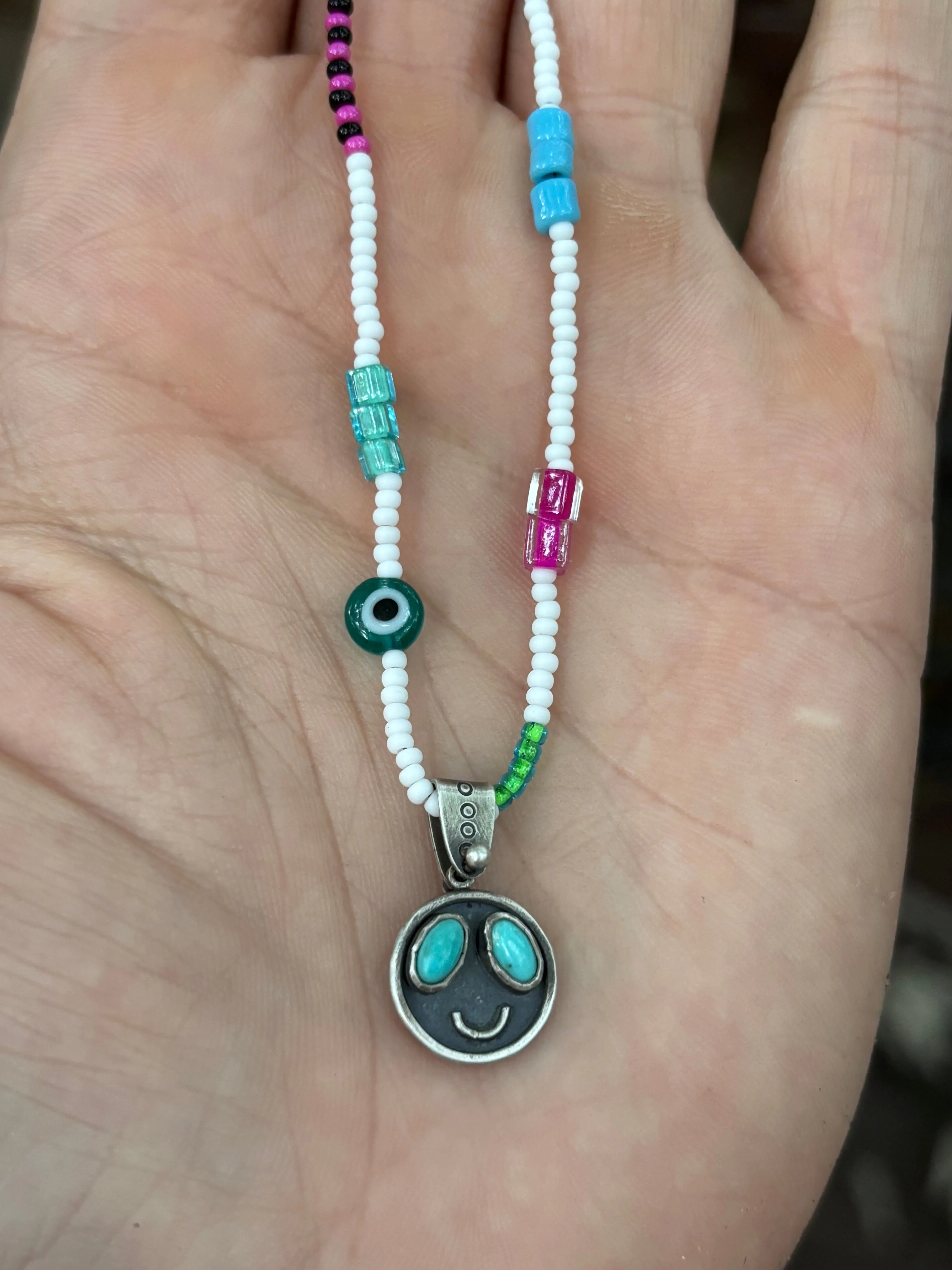 Turquoise Smiley Face