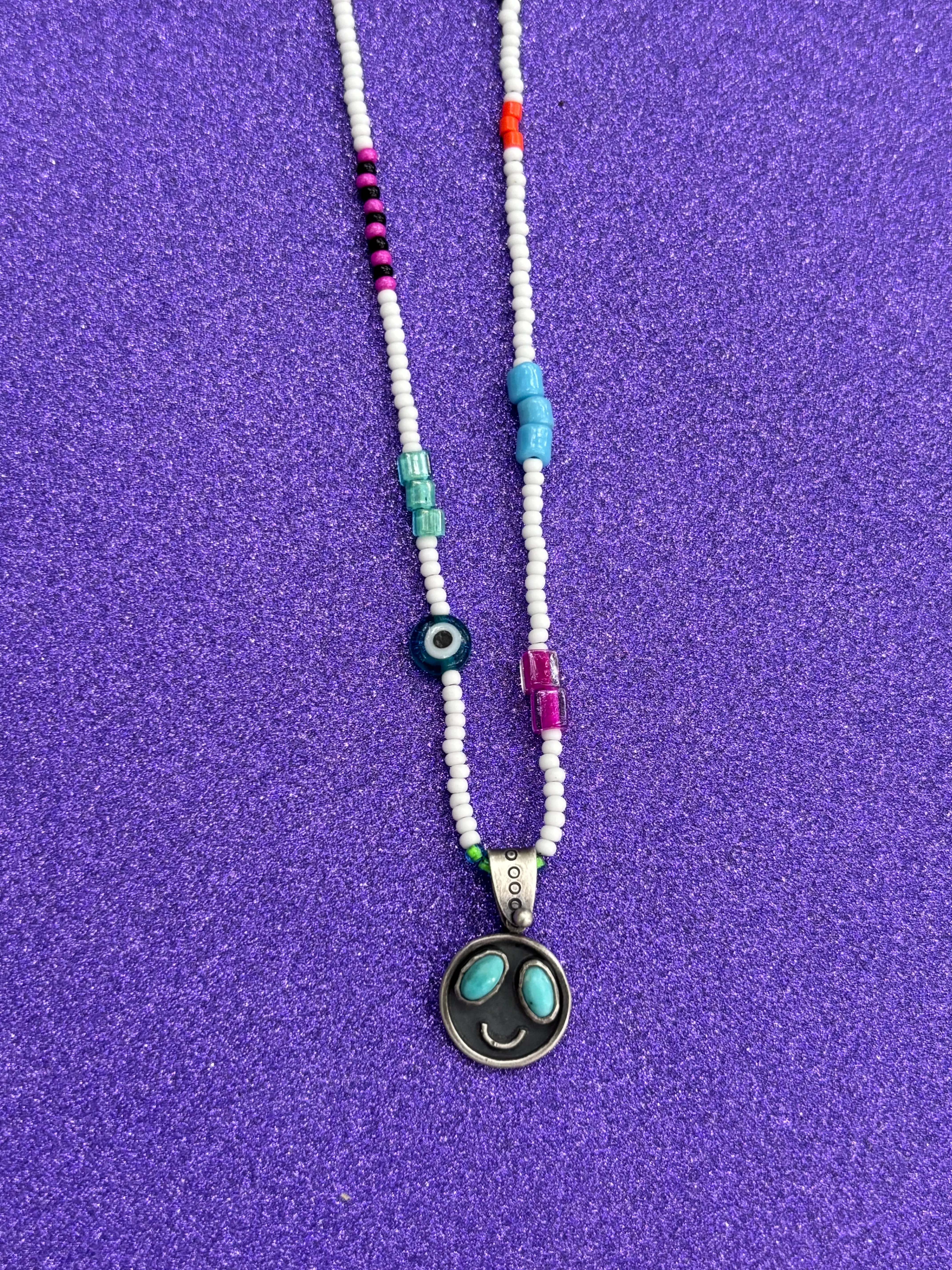 Turquoise Smiley Face