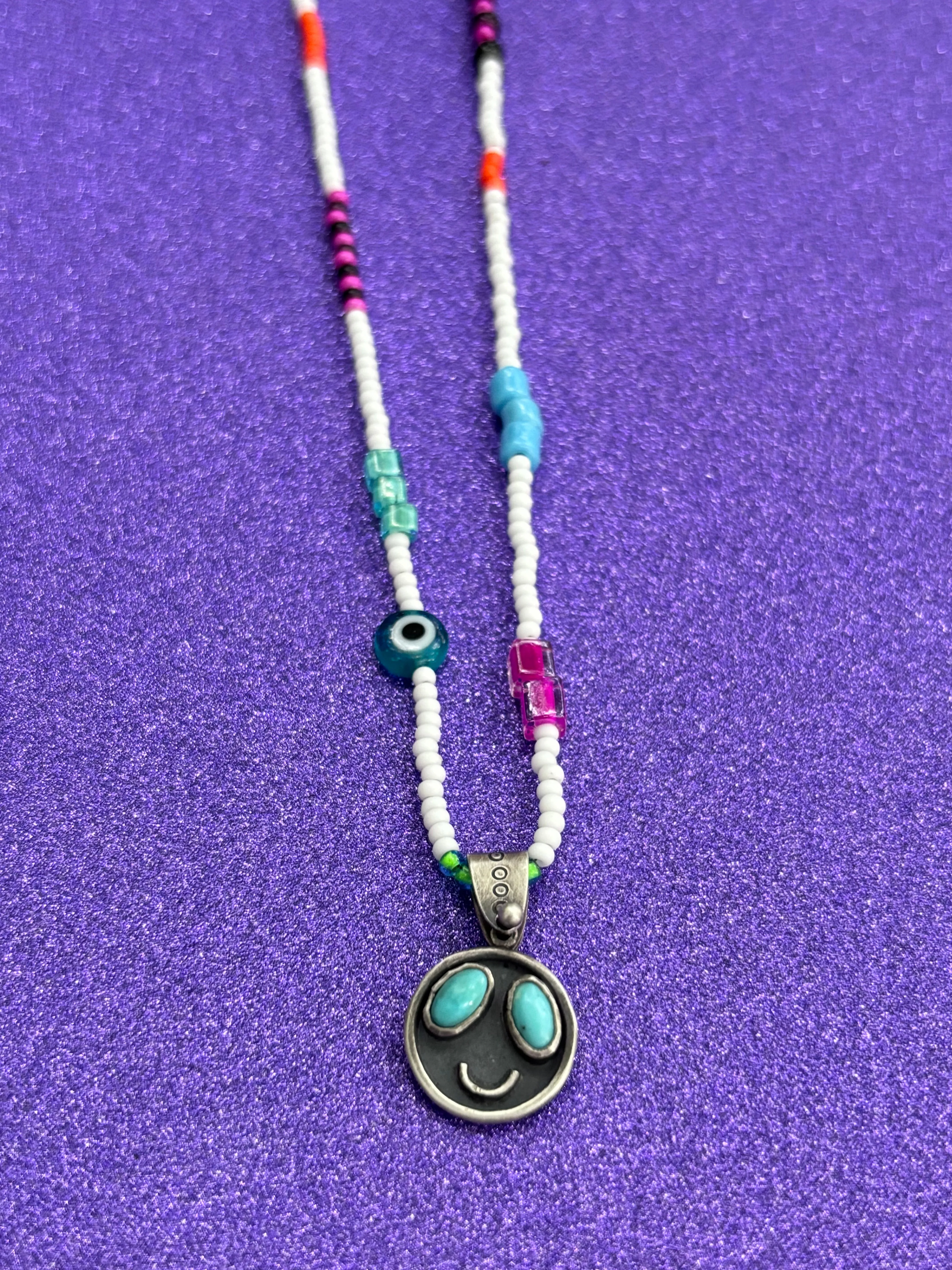 Turquoise Smiley Face